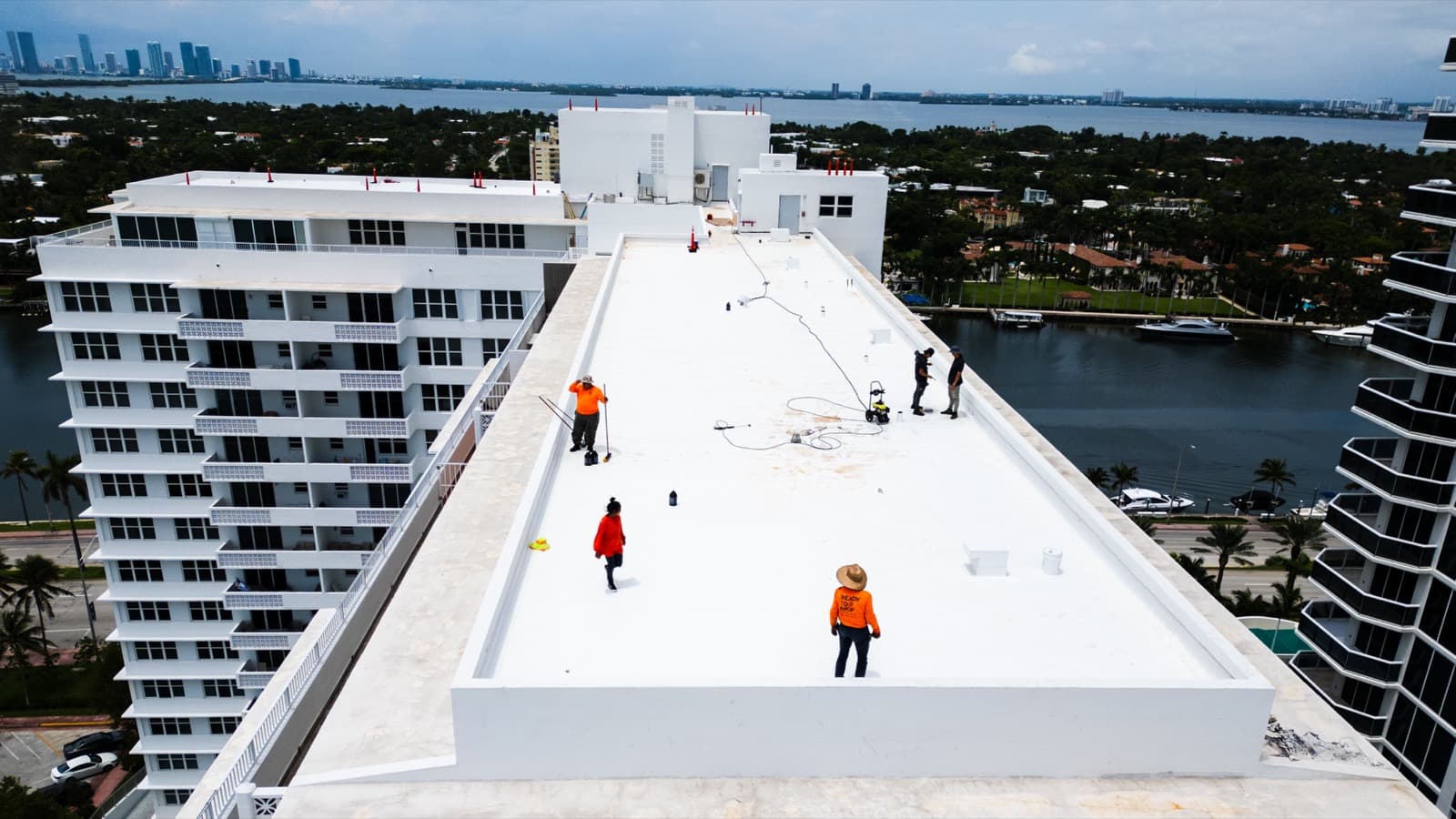 Roofing Up crew working on a Miami rooftop